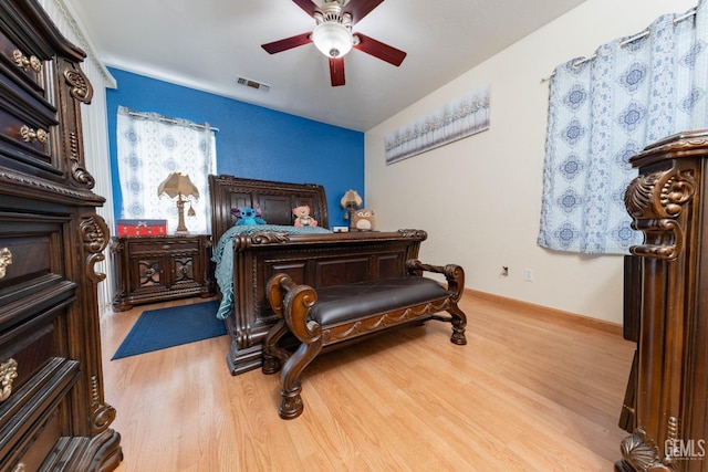 bedroom featuring ceiling fan and light hardwood / wood-style flooring