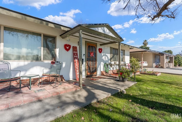 exterior space with a yard and a patio