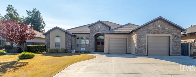 view of front of property featuring a garage