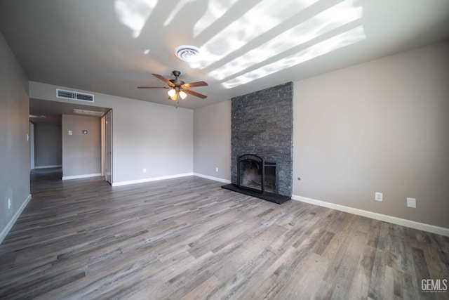 631 Union St, Delano, CA 93215 - unfurnished living room with a ceiling fan, wood finished floors, and baseboards