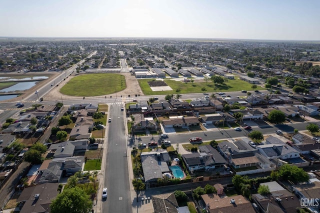 631 Union St, Delano, CA 93215 - aerial view of property and surrounding area featuring nearby suburban area and a large body of water
