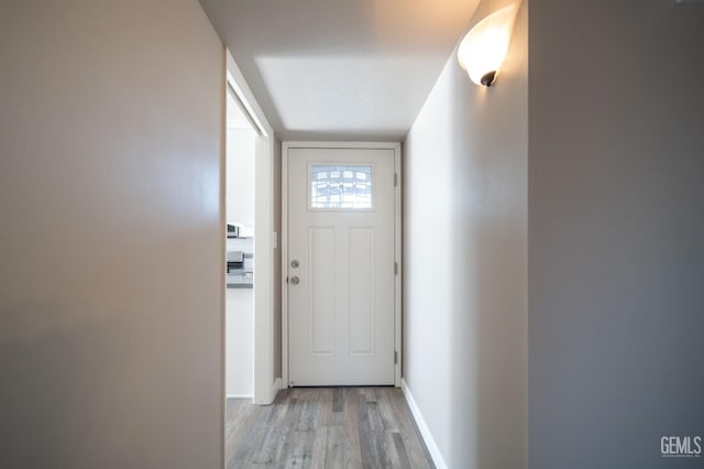 631 Union St, Delano, CA 93215 - entryway with light wood-style flooring and baseboards