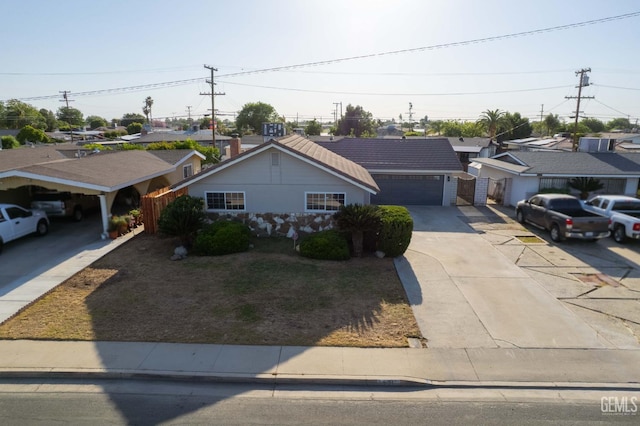 631 Union St, Delano, CA 93215 - single story home featuring concrete driveway, a garage, and a tile roof