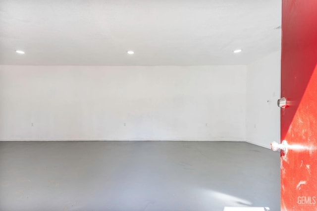 interior space featuring concrete floors and recessed lighting