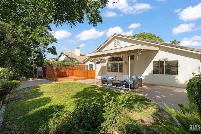 10116 Bay Colony Dr, Bakersfield, CA 93312 - rear view of house featuring stucco siding, an outdoor living space, and a patio area