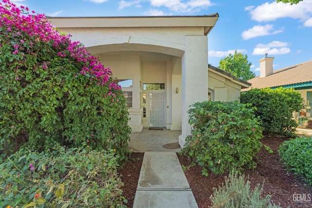 10116 Bay Colony Dr, Bakersfield, CA 93312 - view of exterior entry with stucco siding