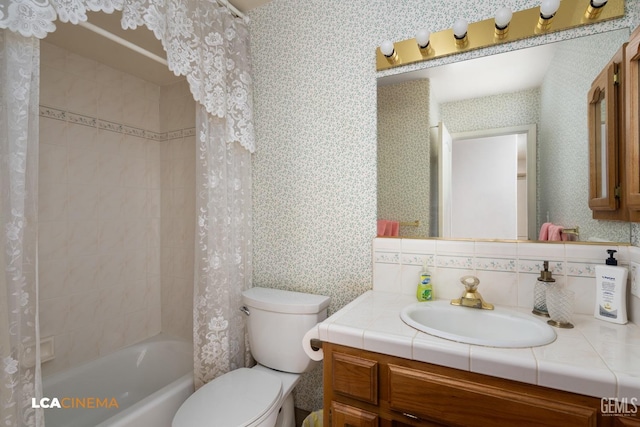 full bath with toilet, wallpapered walls, shower / bath combo, and vanity