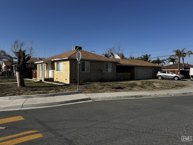 ranch-style house with a garage