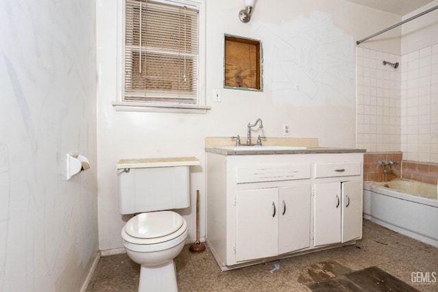 bathroom featuring tub / shower combination, toilet, baseboards, and vanity