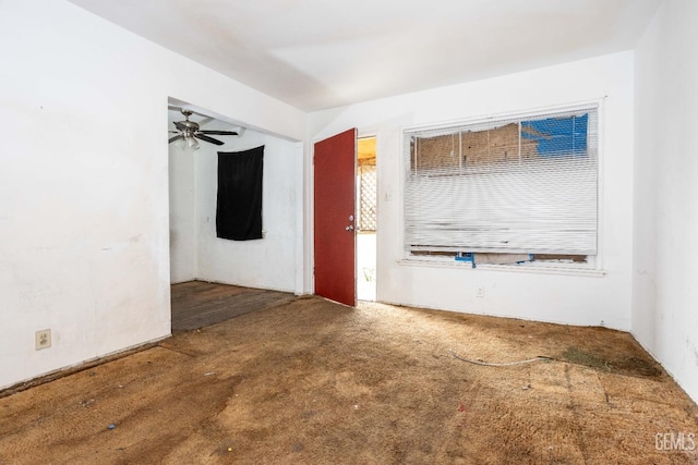 unfurnished room featuring ceiling fan