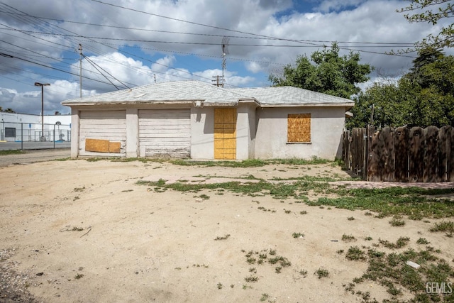 exterior space with fence
