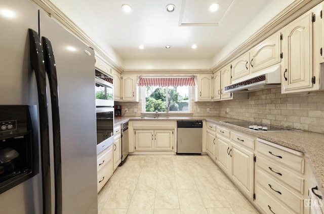 7001 Eloy Ave, Bakersfield, CA 93308 - kitchen with light countertops, tasteful backsplash, appliances with stainless steel finishes, under cabinet range hood, and a sink