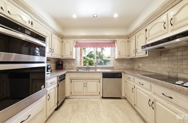 7001 Eloy Ave, Bakersfield, CA 93308 - kitchen featuring light countertops, a sink, appliances with stainless steel finishes, and under cabinet range hood