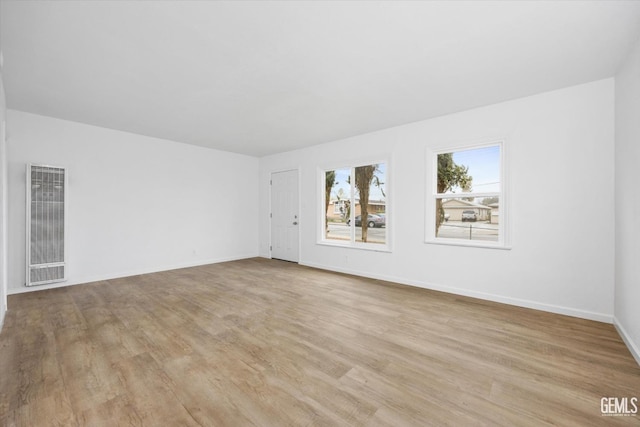 empty room featuring light hardwood / wood-style floors