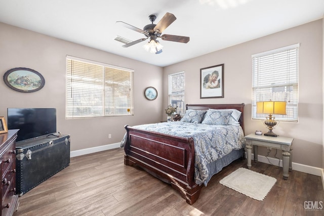 bedroom featuring ceiling fan and hardwood / wood-style floors