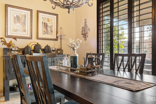 dining room featuring a notable chandelier