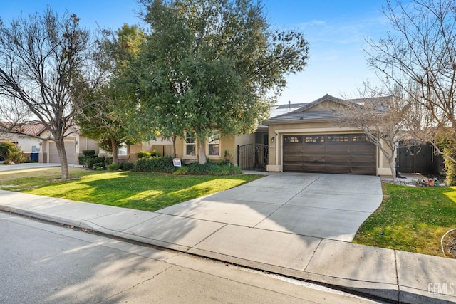 view of front facade featuring a garage and a front yard