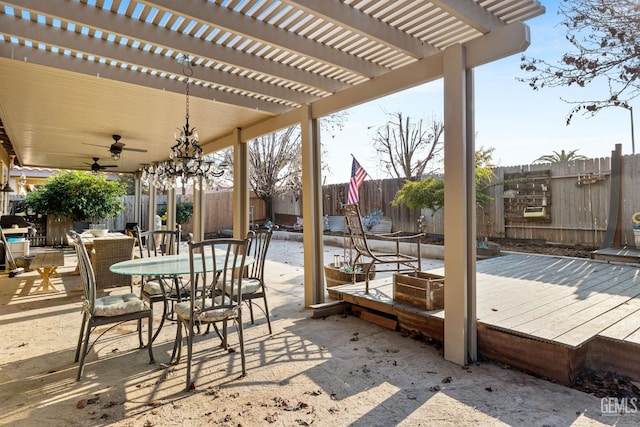 view of patio with ceiling fan, a wooden deck, and a pergola