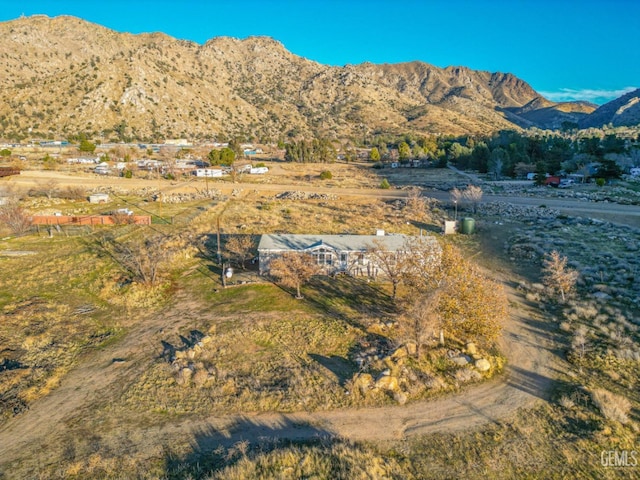 view of mountain feature with a rural view