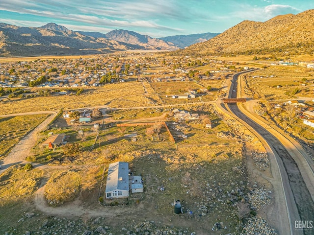 drone / aerial view featuring a mountain view