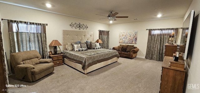 carpeted bedroom with ceiling fan