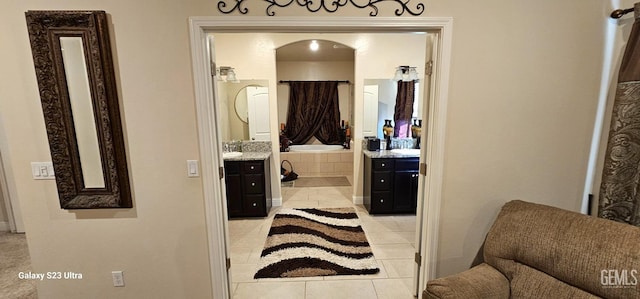 bathroom with vanity and tile patterned flooring