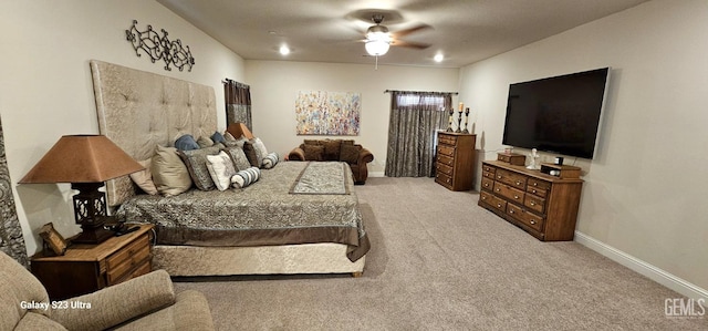 carpeted bedroom featuring ceiling fan