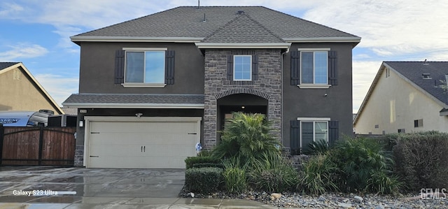 view of front of property featuring a garage