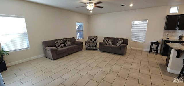 living room with ceiling fan