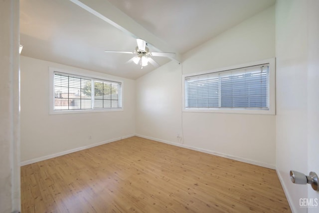 unfurnished room with ceiling fan, light wood-type flooring, and vaulted ceiling with beams