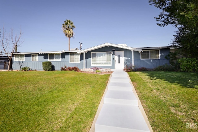 ranch-style house with a front yard