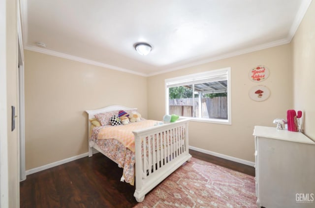 1107 Mcginley Ave, Bakersfield, CA 93308 - bedroom with wood finished floors, crown molding, and baseboards