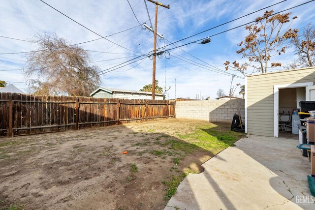 rear view of property featuring a patio area