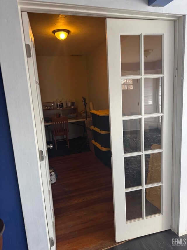 hallway featuring hardwood / wood-style floors