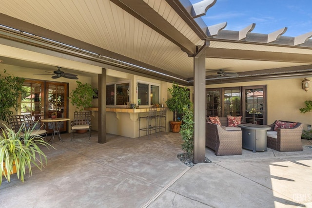 view of patio / terrace with exterior bar