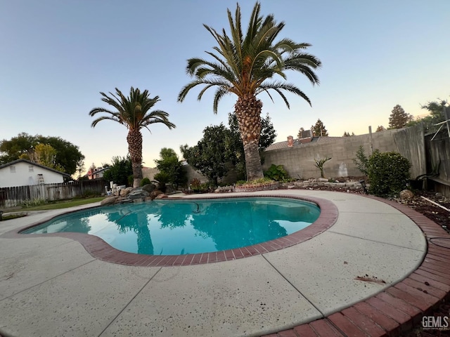 3205 Petite Sirah St, Bakersfield, CA 93306 - view of pool with a fenced backyard and a patio