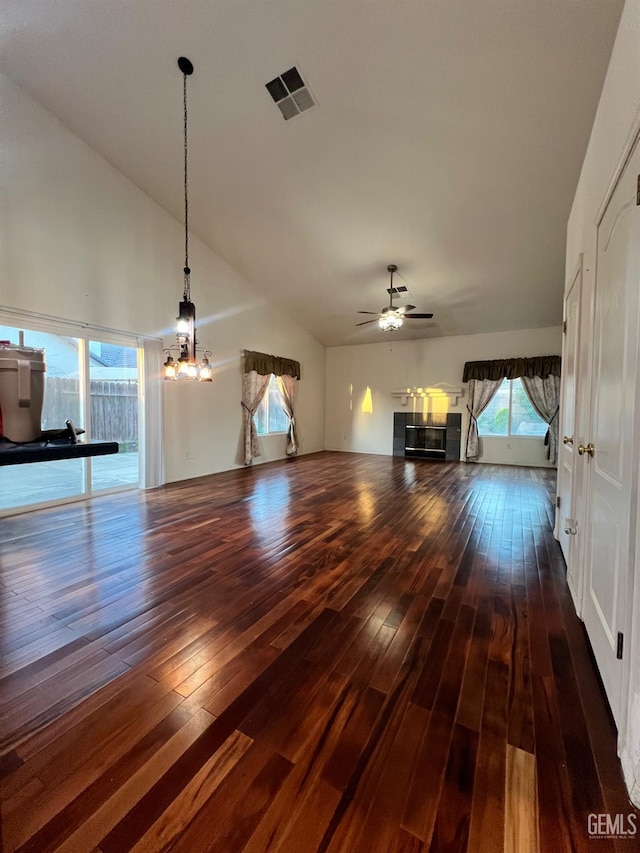 3205 Petite Sirah St, Bakersfield, CA 93306 - unfurnished living room featuring a ceiling fan, hardwood / wood-style flooring, healthy amount of natural light, and high vaulted ceiling