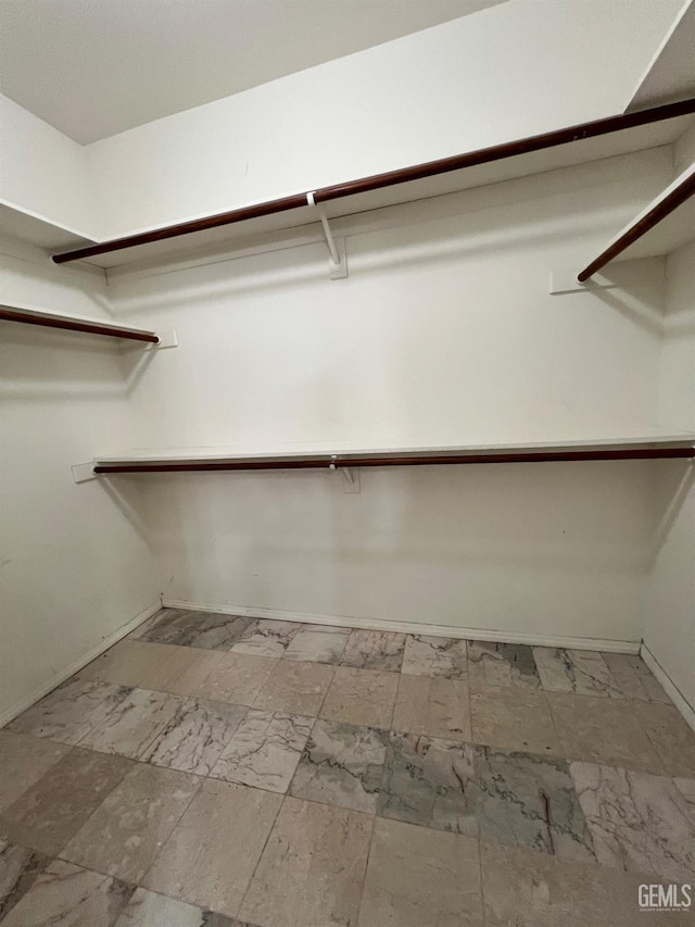 3205 Petite Sirah St, Bakersfield, CA 93306 - walk in closet featuring marble finish floors