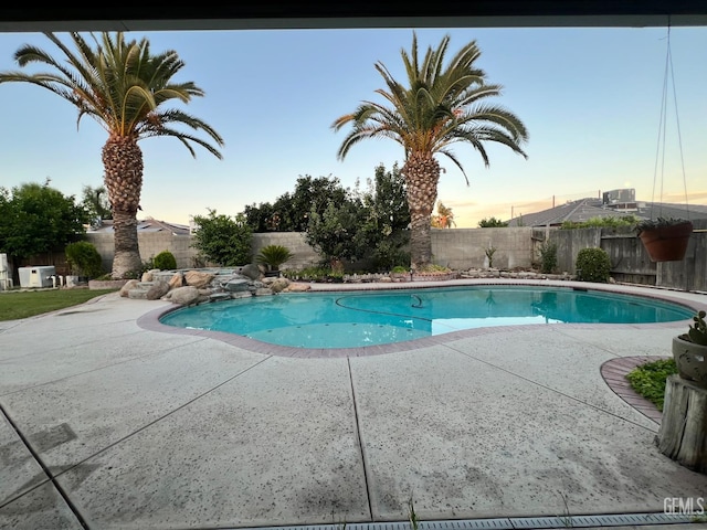 3205 Petite Sirah St, Bakersfield, CA 93306 - view of pool with a patio and a fenced backyard