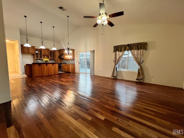 3205 Petite Sirah St, Bakersfield, CA 93306 - unfurnished living room with dark wood-type flooring, high vaulted ceiling, and a ceiling fan