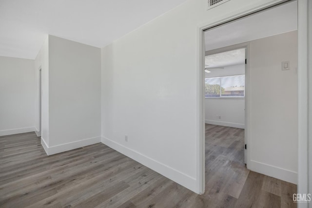 1813 6th Ave, Delano, CA 93215 - unfurnished room with wood finished floors and baseboards