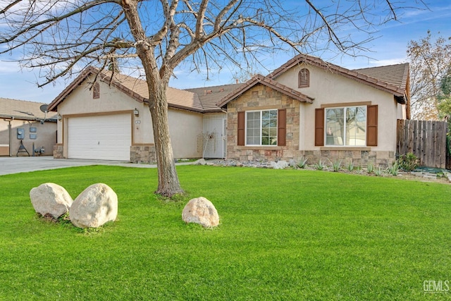 ranch-style house with a garage and a front yard