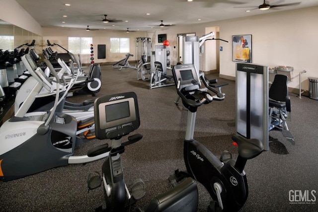 gym with a ceiling fan, recessed lighting, and baseboards