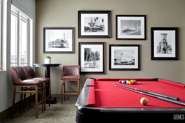 rec room with billiards, baseboards, a wealth of natural light, and carpet flooring