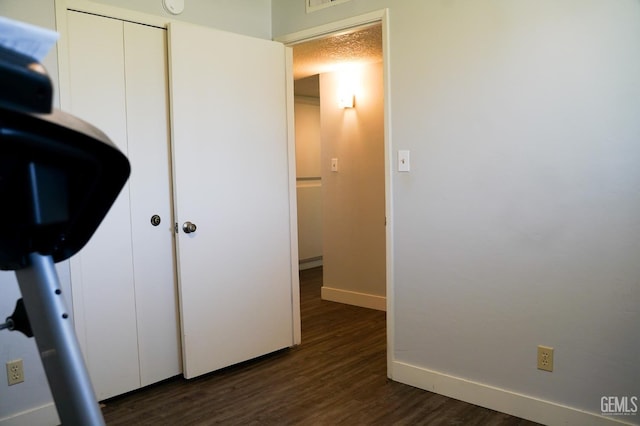 5421 Demaret Ave, Bakersfield, CA 93309 - unfurnished bedroom featuring dark wood finished floors and a closet