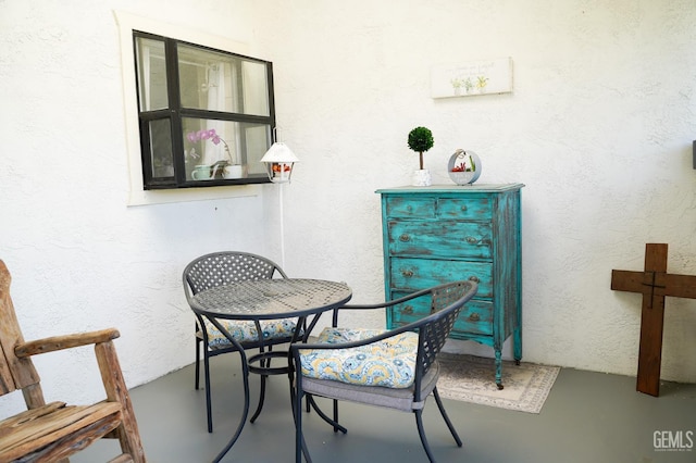 5421 Demaret Ave, Bakersfield, CA 93309 - dining area with concrete flooring and a textured wall