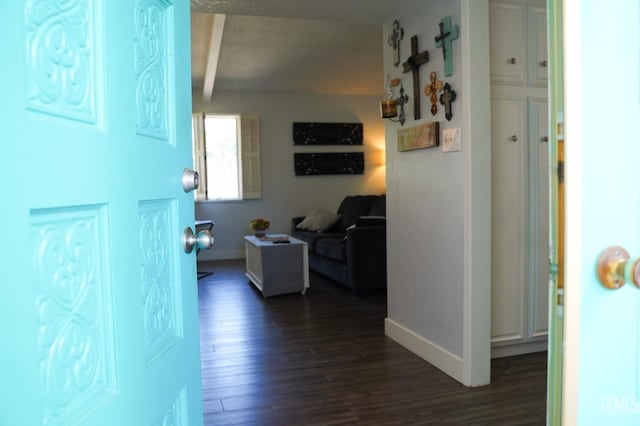 5421 Demaret Ave, Bakersfield, CA 93309 - foyer entrance with dark wood-style floors and beam ceiling