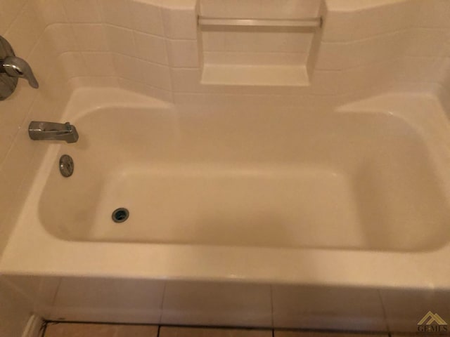 bathroom featuring shower / washtub combination