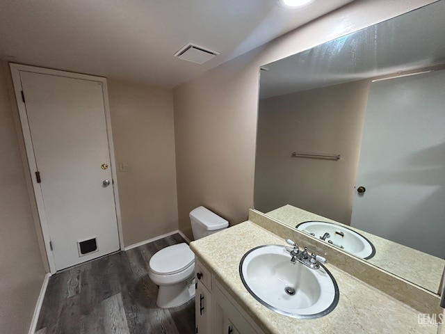 2626 Cleo Ct Unit 20, Bakersfield, CA 93306 - half bathroom with wood finished floors and vanity