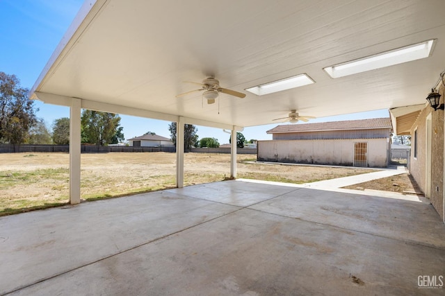 view of patio / terrace featuring a ceiling fan and fence
